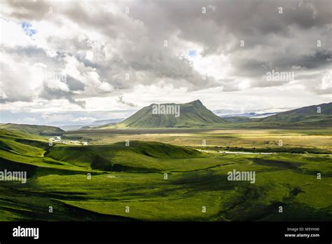 waterfall in green iceland landscape Stock Photo - Alamy