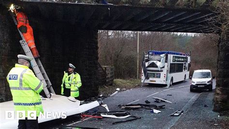 Double decker bus roof ripped off in Fauldhouse bridge crash