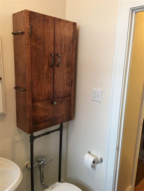 Bathroom cabinet over the toilet cabinet. This was built for a small Chicago bathroom. Never ...