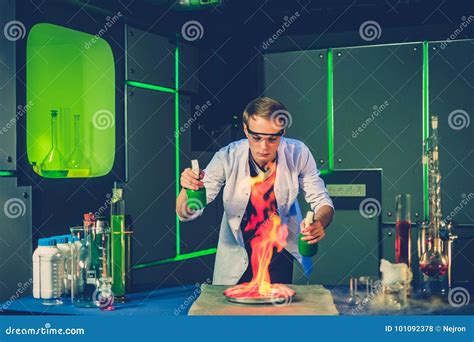 Young Chemist Making Experiments in Laboratory Stock Photo - Image of ...