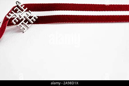 Ribbon in Latvian flag colors and Latvian traditional thunder cross ...