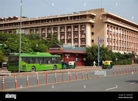 View of buildings and traffic outside the entrance to the Central Secretariat metro station near ...