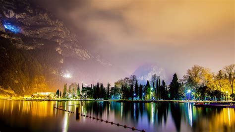 A colorful night suspended in time on lake Garda, Riva del Garda, Italy ...