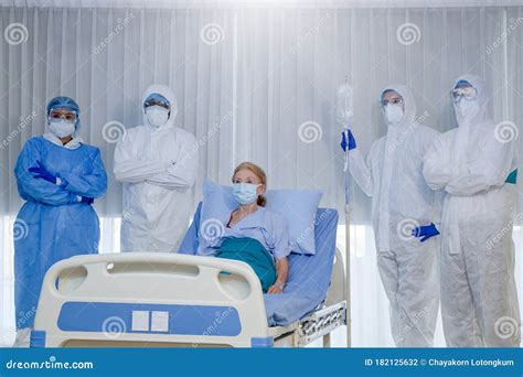 Medical Team Take To Female Patient Coronavirus Stock Photo - Image of ...