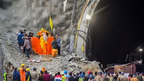 Locals bring 'doli' of local deity to Uttarkashi tunnel collapse site. Watch | Latest News India ...