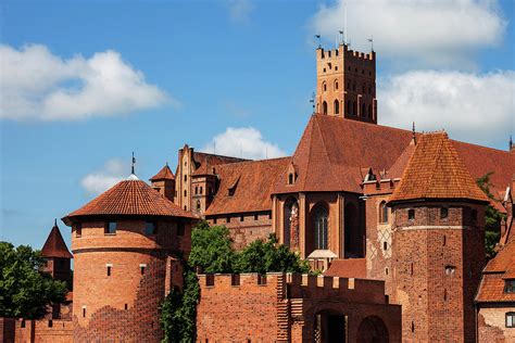 The Malbork Castle in Poland Photograph by Artur Bogacki - Fine Art America