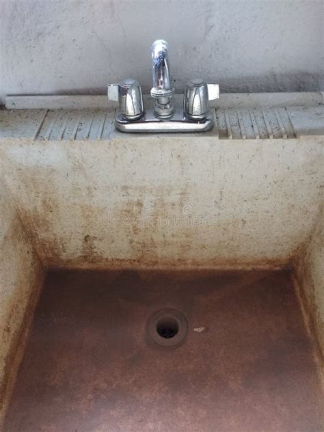 Dirty Slop Sink with Shiny Polished Chrome Faucet Stock Image - Image of droughts, drain: 72121915