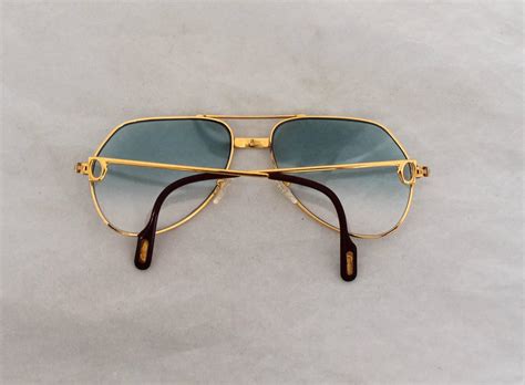 Cartier Gold Rimmed Aviator-Style Sunglasses w/ Blue Faded Lenses For ...