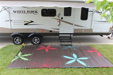 This 9x16 outdoor RV patio mat works great under your cooking area while camping. Grills and ...