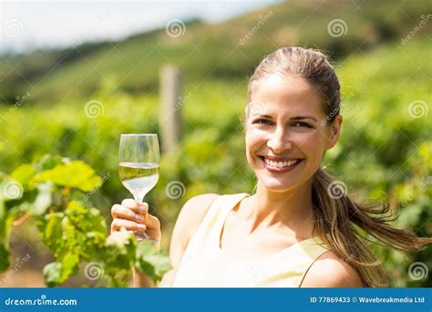 Portrait of Female Vintner Holding Wine Glass Stock Image - Image of agriculture, rural: 77869433