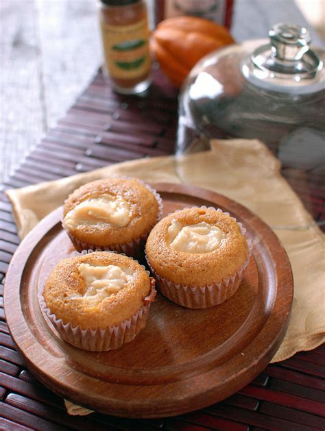 Pumpkin Cupcakes w/ Molasses Cream Cheese Filling - Two Lucky Spoons