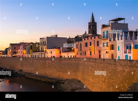 Alghero Sardinia old town, a view along the historic sea wall in ...