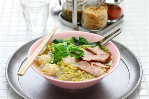 Bami Nam, Egg Noodles Soup Served with Roast Pork Stock Photo - Image of dish, bami: 130103616