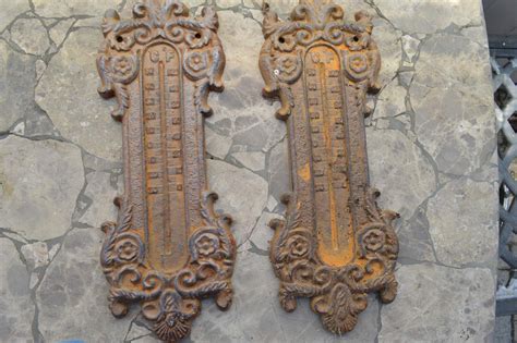 Lot # 319 Pair of cast iron wall decor - Just Right Estate Sales