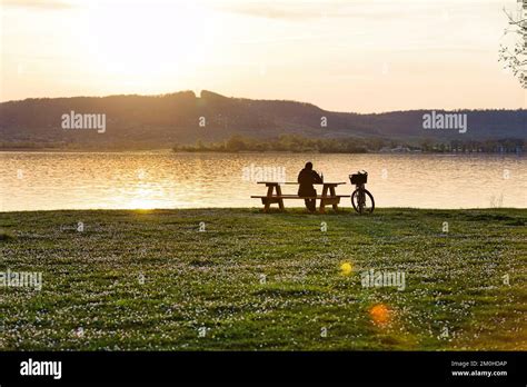 France, Meuse, Lorraine Regional Natural Park, Nonsard, Madine lake, person on a bike enjoying ...