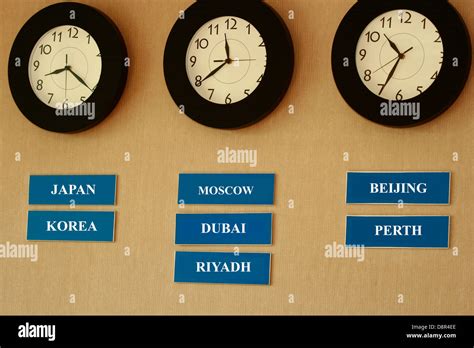 Wall Clock Time zone in japan korea and beijing Stock Photo - Alamy