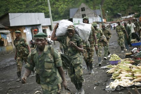 Congo M23 rebels surrender in Uganda, official says - CSMonitor.com