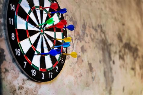 Free Photo | Dartboard arrows hit target game activity