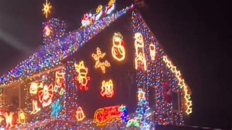 House wrapped in Christmas lights proves that the holiday cheer is ...