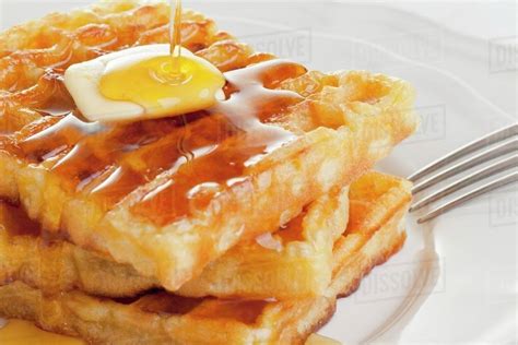 Waffles with butter and honey - Stock Photo - Dissolve