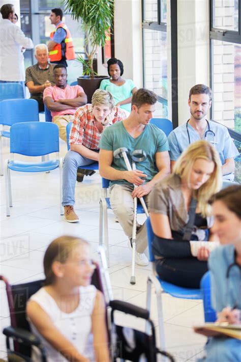 Patients in hospital waiting room - Stock Photo - Dissolve