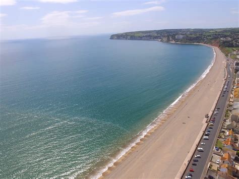 Seaton Beach looking across Lyme Bay | Beach local, Dorset beaches, Beach