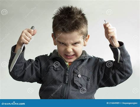 Child With A Knife And Fork Royalty Free Stock Images - Image: 21604989