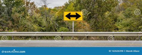 Double arrow traffic sign stock photo. Image of rail - 162626398