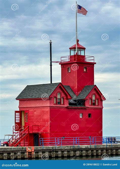 Holland Harbor Lighthouse at Holland State Park in Michigan Editorial ...