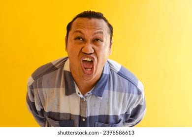 Adult Asian Man Showing Funny Ugly Stock Photo 2398586613 | Shutterstock