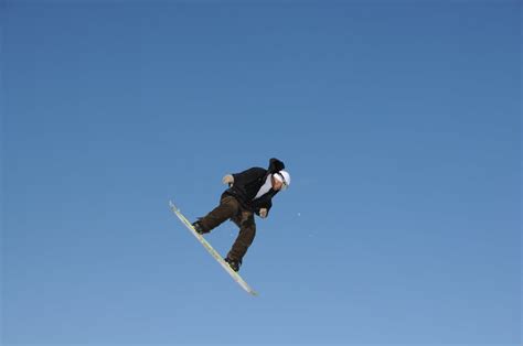 Snowboard Backside 180 | Unknown snowboarder performing his … | Flickr