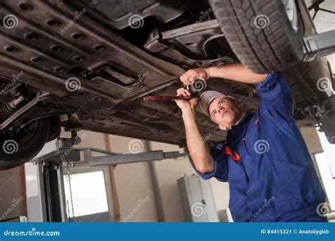 Portrait of Car Mechanic Working with Tools Under Car Stock Image ...