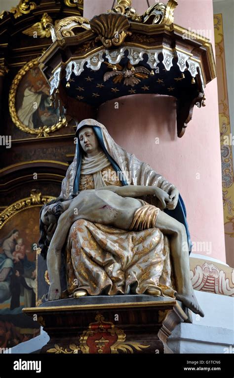 Sculpture of Mary holding the body of Jesus, in the Catholic Church of ...