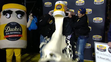 West Virginia coach Neal Brown gets doused in mayo after Mountaineers win Duke's Mayo Bowl