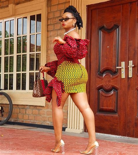 Yemi Alade Rocks A Gorgeous Ankara Mini Dress With PVC Heels | FPN