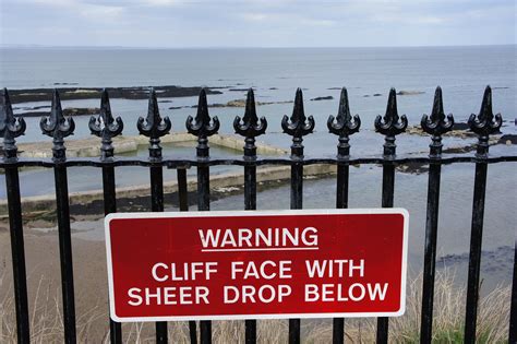 Download free photo of Warning,danger,cliff,sign,caution - from needpix.com