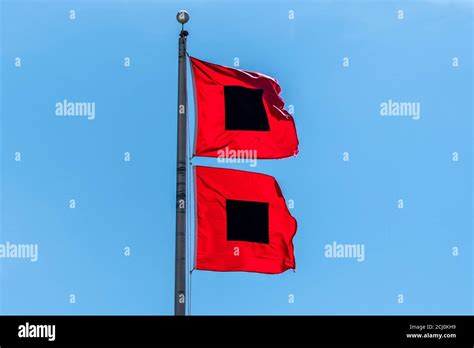 Hurricane warning flag hi-res stock photography and images - Alamy