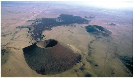 A volcanic cinder cone and lava flow in northern Arizona. (Reproduced by permission of The Stock ...