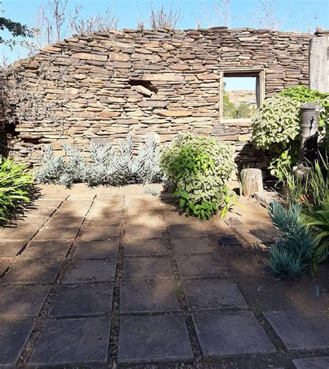 Old Stone Wall in a Beautifully Landscaped Garden Stock Photo - Image of stone, garden: 168081556