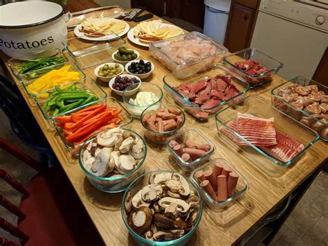 [Homemade] Raclette dinner spread with all the vegetables, cheeses and meats : food