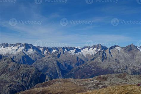 hiking in the swiss alps 10305801 Stock Photo at Vecteezy