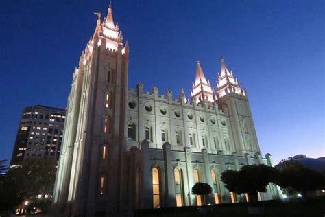 the large cathedral is lit up at night