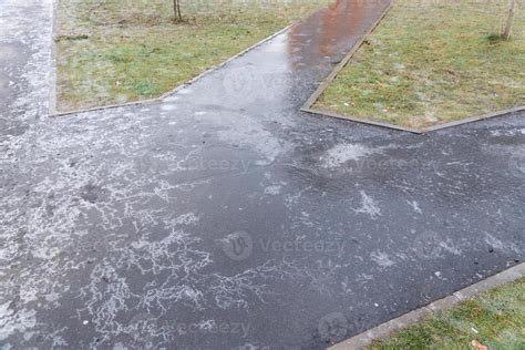 Surface of a snowy, slippery road on a winter day. 11867463 Stock Photo at Vecteezy