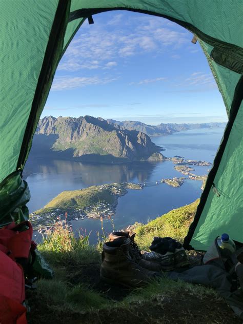 GF and I spent the night overlooking Reine from Reinebringen, Norway : r/pics