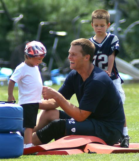 Tom Brady is taking heat for his 'uncomfortably' long kiss with his son