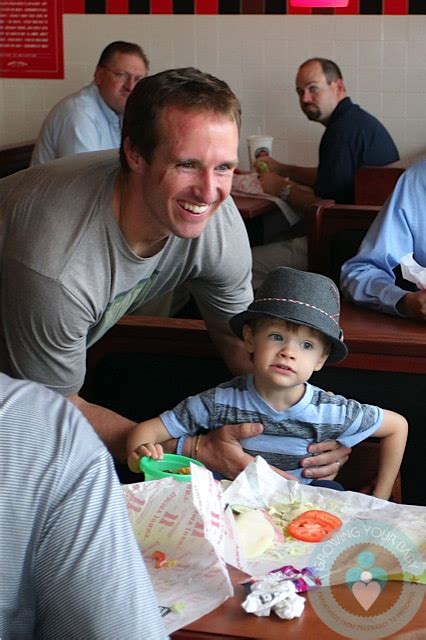 Drew Brees with son Baylen in New Orleans - Growing Your Baby