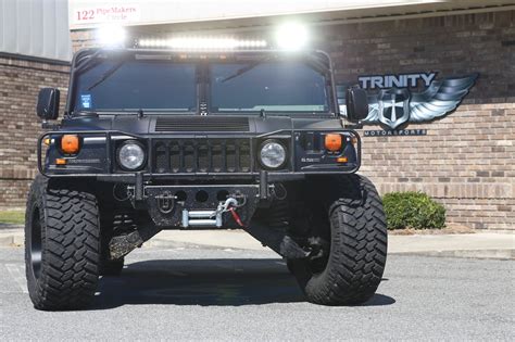 Lifted Hummer H1 on Moto Metals - Trinity Motorsports