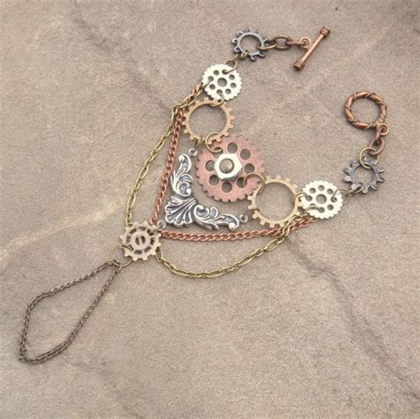 Rustic Steampunk Gear Layered Ring Slave Bracelet by ShambleRamble, $45.00 Steampunk Jewerly ...