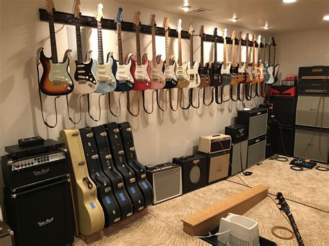 Home Guitar Studio | Guitar wall, Guitar studio, Guitar shelf