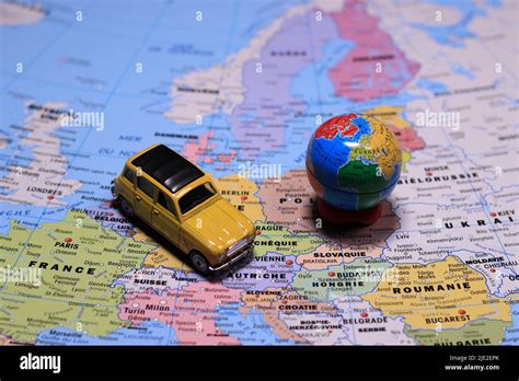 From above car on europe map. Plan your next road trip with TRAVEL MAP Stock Photo - Alamy